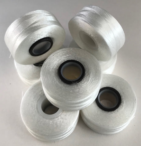 Picture of MAGNETIC CORE SIDELESS WHITE PRE-WOUND EMBROIDERY BOBBINS "L"